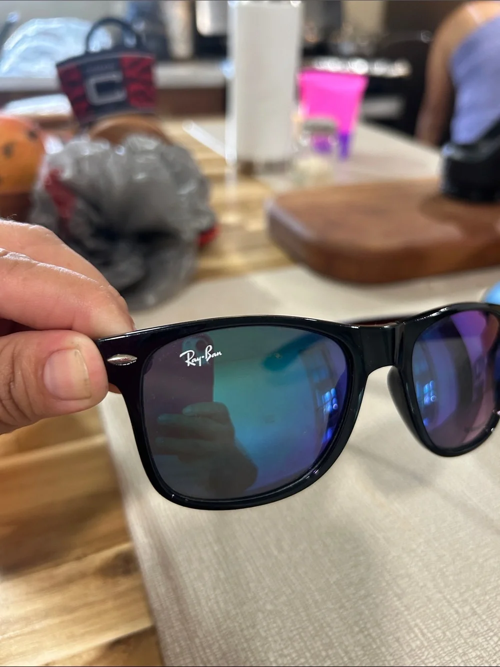 Ray-Ban Black Frame Sunglasses with Blue-Purple Mirrored Lenses